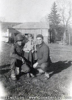 [11th Armored Division Belgium: Dowden, Cristina, & The Kid. Neuendorf, Belgium. Feb. 1945.]