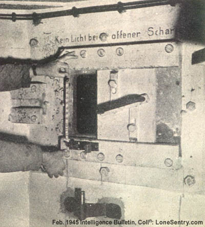 [Interior of German pillbox showing details of embrasure closure plate.]