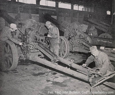 [Ordnance Technical Intelligence men reconditioning captured German 105-mm howitzers.]