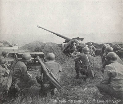 [American artillerymen fire a captured Pak 43 at the retreating German army in the area around Metz, France.]