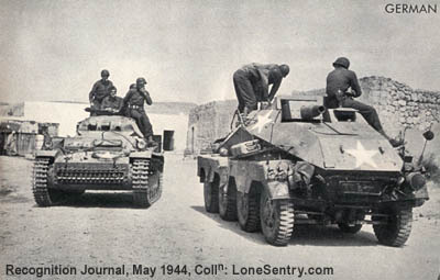 [Captured German Panzer II tank and 8-wheeled armored car]
