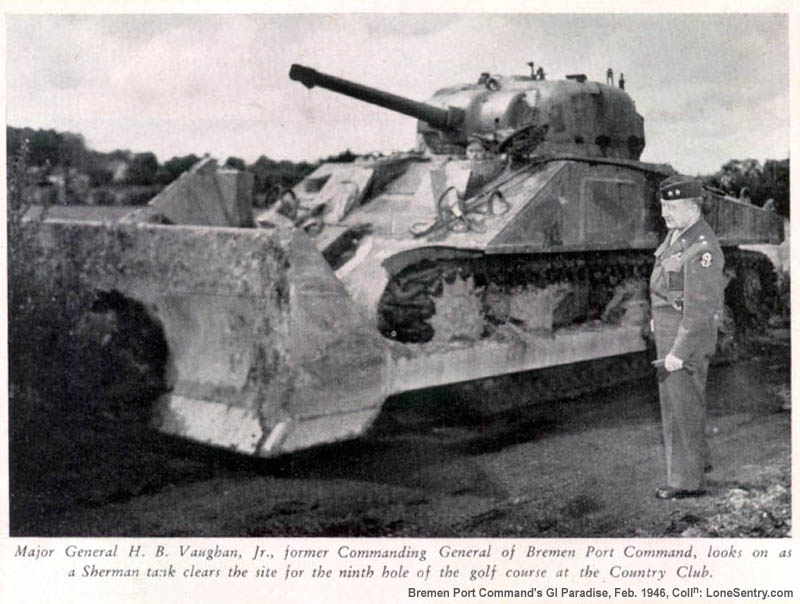 [Major General H. B. Vaughan, Jr., former Commanding General of Bremen Port Command, looks on as a Sherman tank clears the site for the ninth hole of the golf course at the Country Club.]