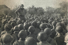 [101st Airborne Division: Gen. Anthony C. McAuliffe speaks to officers and men]