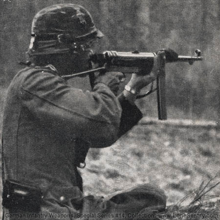[Figure 9. M.P. 40 in action. (This photograph shows the manner of holding the pistol with the left hand when using the skeleton shoulder stock.)]