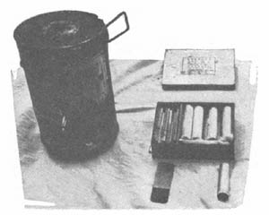 [Figure 280. 10 kg smoke candle and igniters.]