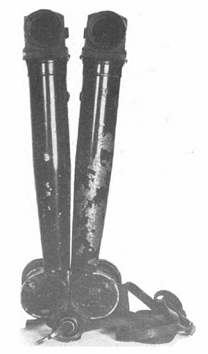 [Figure 299. This battery commanders telescope has an 8 X magnification and a 6° field of view. It is constructed so that the telescopic arms may be placed in a horizontal position for better stereoscopic vision. ]